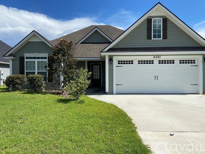A house with a garage door numbered 091.