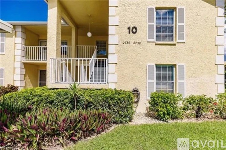 A building with the number 10 on it and the address 2756-2758.