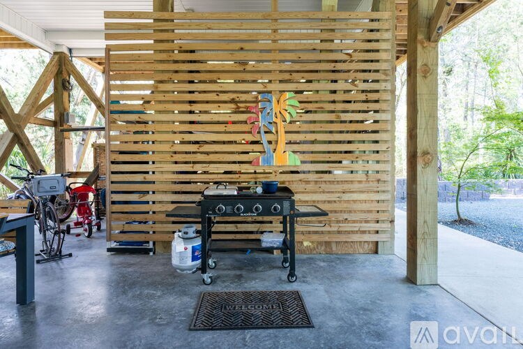 A wooden wall with a painting on it.