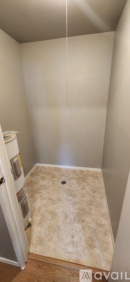 A bathroom with a toilet and a sink.