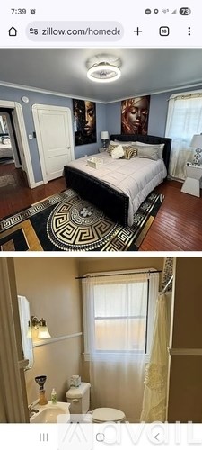 A bedroom with a large bed and a bathroom with a toilet and shower.