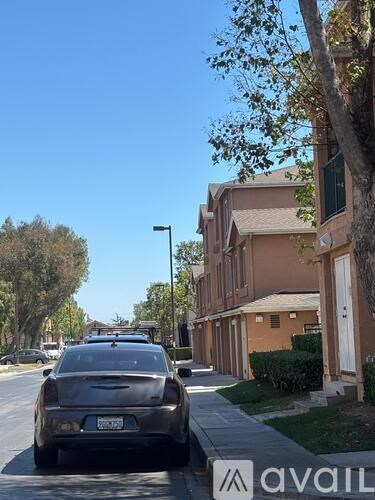 A car is parked on the side of a street.