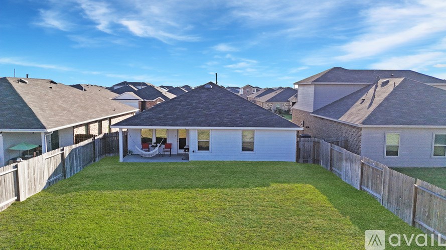 A house with a large backyard is for sale.