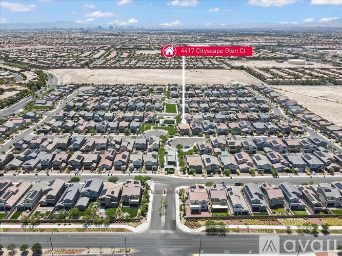 A bird's eye view of a residential area with a street sign reading 4417 Citiescape Glen Ct.