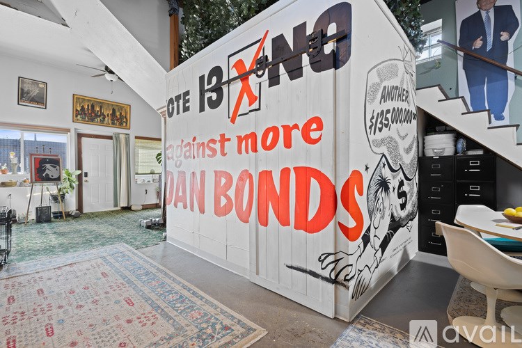 A white wall with a mural that says "more than $13 trillion against more than 100 million bonds".