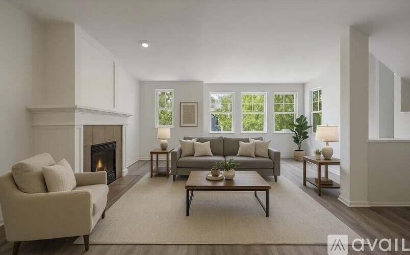 A living room with a fireplace and a couch.
