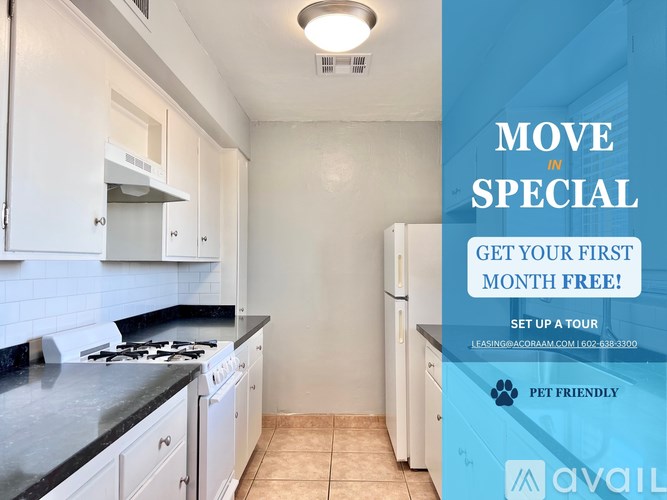 A kitchen with a sign offering a free first month for a move in special.