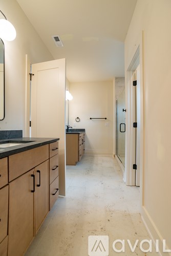 A kitchen with wooden cabinets and a countertop.