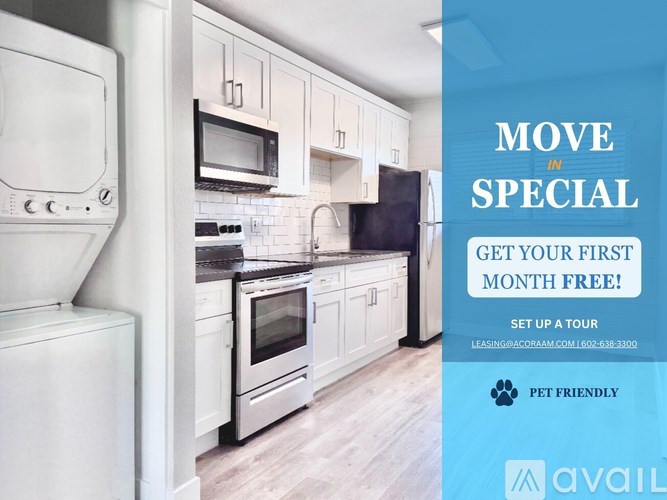 A kitchen with a sign offering a free first month of rent.