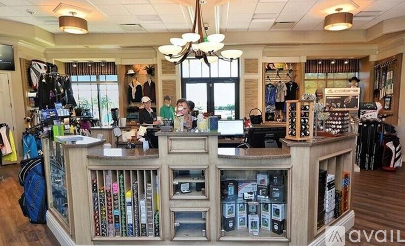 A store interior with a counter and shelves stocked with items.