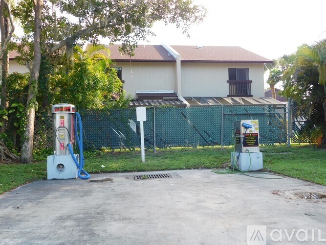 A white and blue water pump is on the left and a white and red water pump is on the right.
