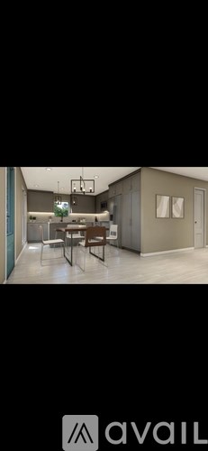 A kitchen with a dining table and chairs.