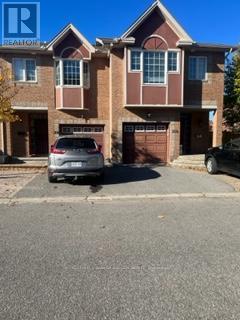 A house with a Realty logo in the corner.