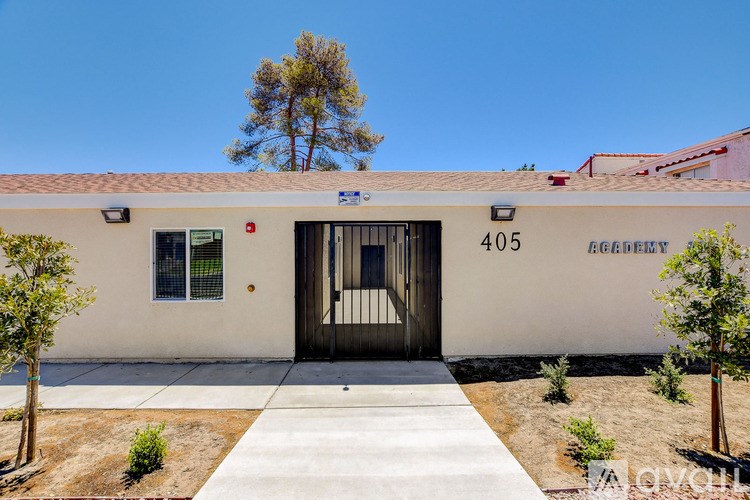 The image shows a building with the number 405 and the name "Laguna" on it.