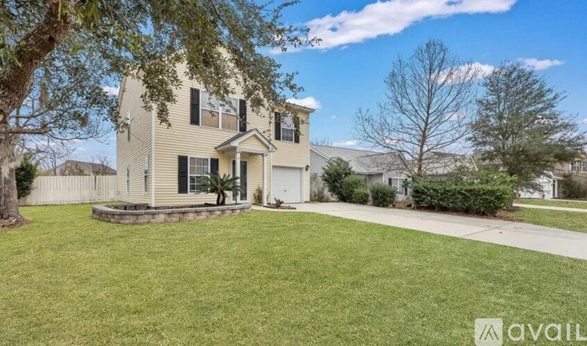 A house with a lawn in front of it is for sale.