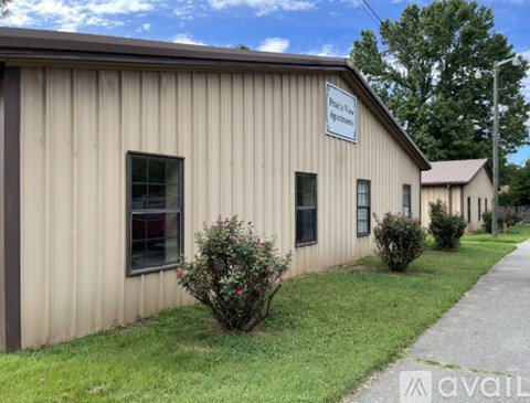 A building with a sign that says "Park View Apartments" is shown.