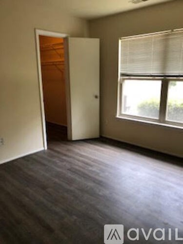 A room with a door and a window.