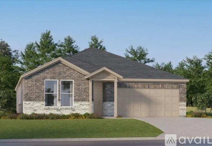 A house with a grey roof and a garage door.