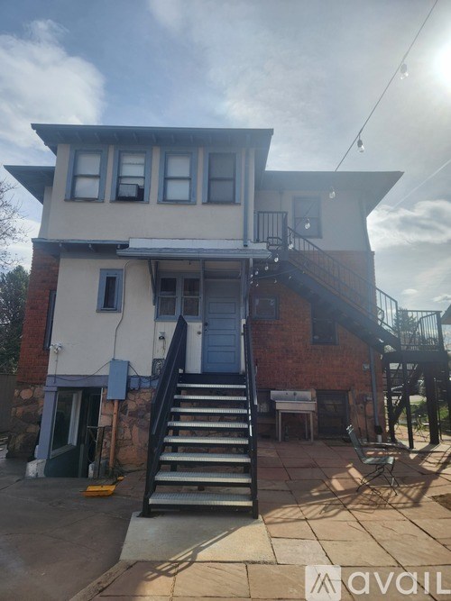 A house with a staircase leading to the second floor.