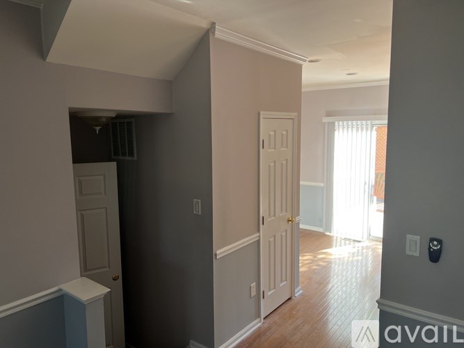 A room with a door and a window.