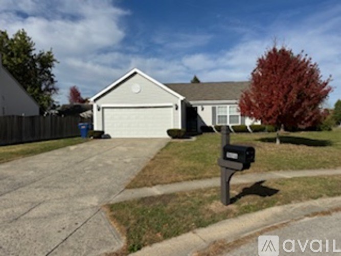 A house with a mailbox in front of it.