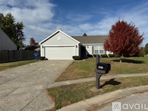 A house with a mailbox in front of it.