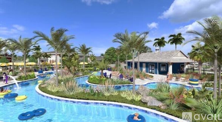 A pool with a blue tinted water and a yellow floating ring.