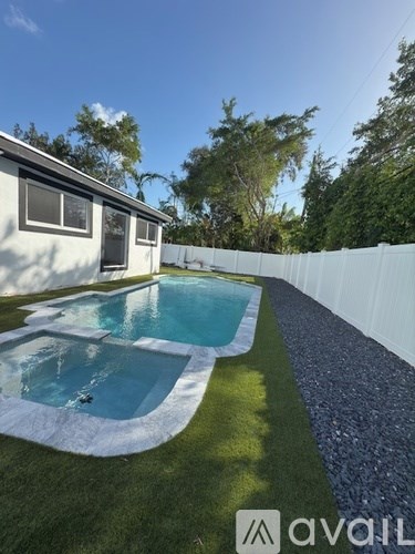 A small swimming pool in a backyard.