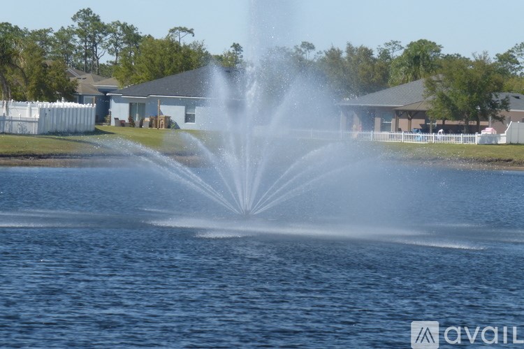 A large fountain is shooting water high into the air.