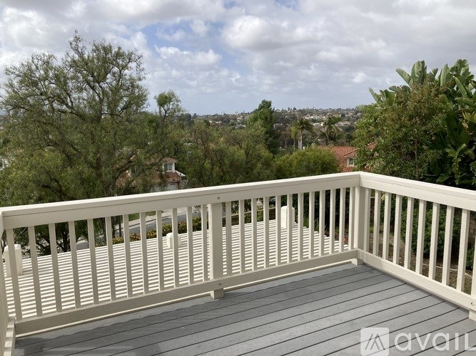 A deck with a view of the city.