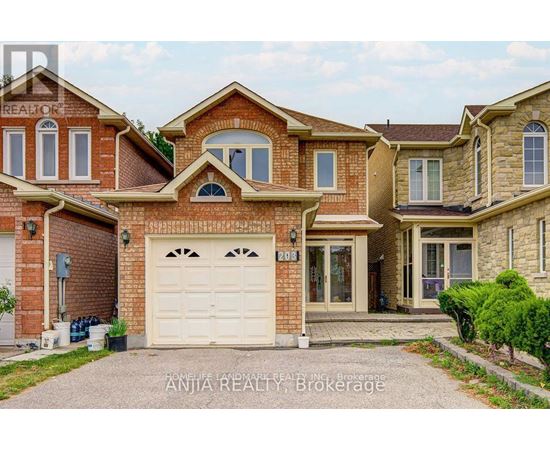 A large, two-story house with a garage and a driveway.
