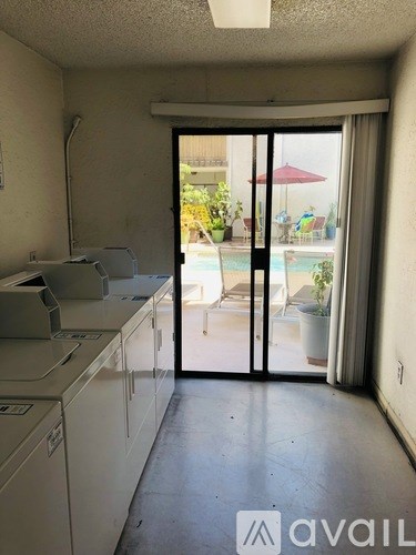 A laundry room with a washer and dryer.