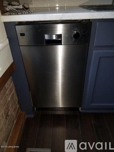 A stainless steel dishwasher in a kitchen.