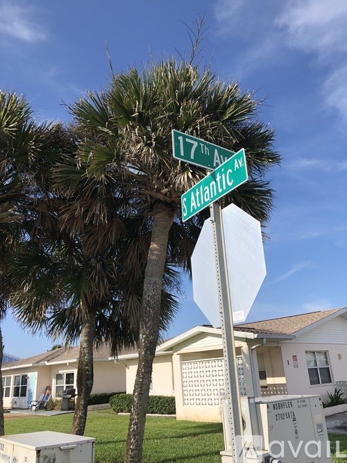 A street sign for 17th Ave and S Atlantic Ave is shown.