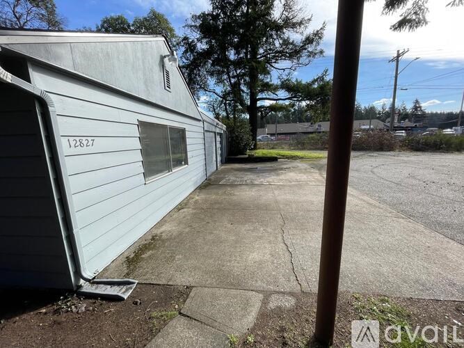 A white building with the number 12827 on it.