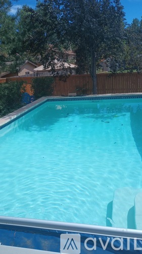 A pool with a sign that says "available" on the side.