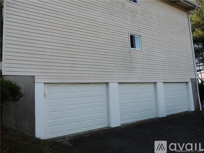 A house with a white garage door.