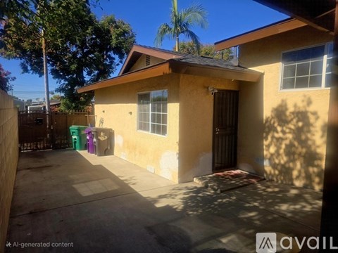A house with a brown door and a window is shown.