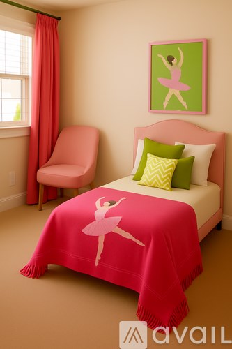 A pink bedroom with a pink chair and a pink blanket with a ballerina design.
