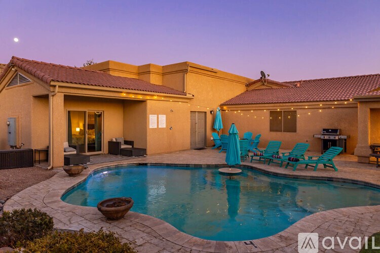 A house with a pool in the backyard.