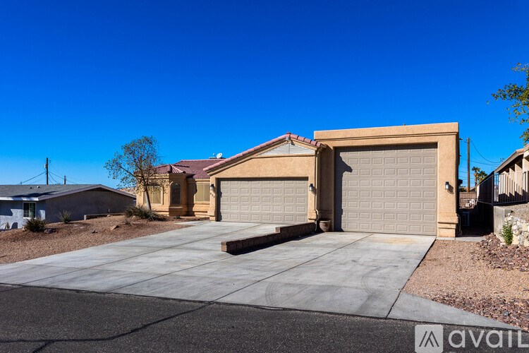 A house with a garage is available for sale.