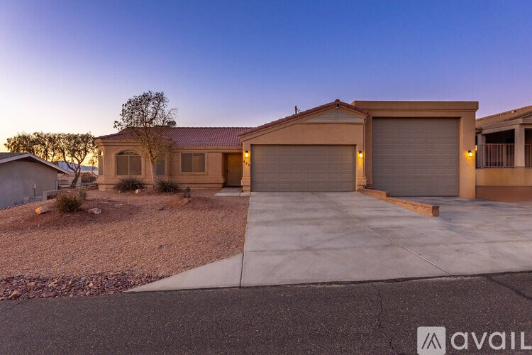 A house with a garage is available for sale.