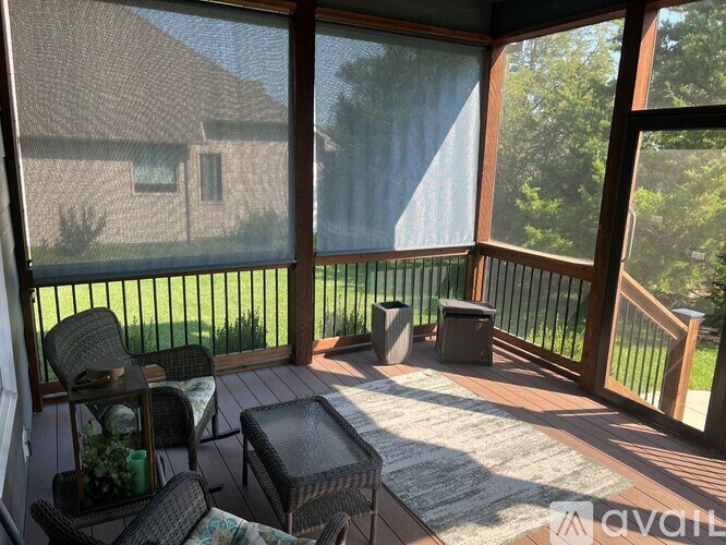 A patio with a table and chairs is shown.