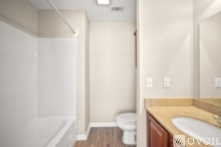 A bathroom with a toilet and sink.