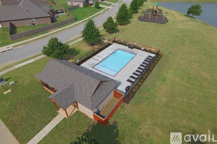 A house with a pool in the backyard.