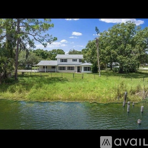 A house is situated by a body of water.