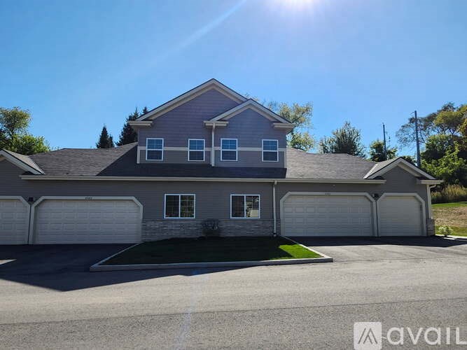 A house with a garage is available for sale.