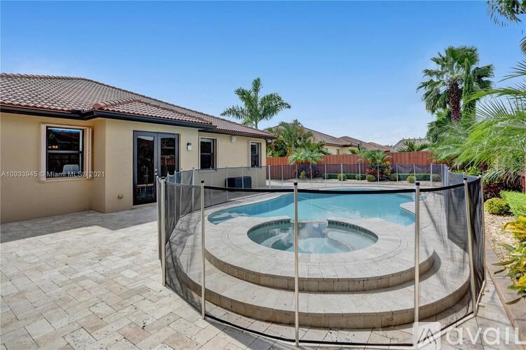 A house with a pool in the backyard.