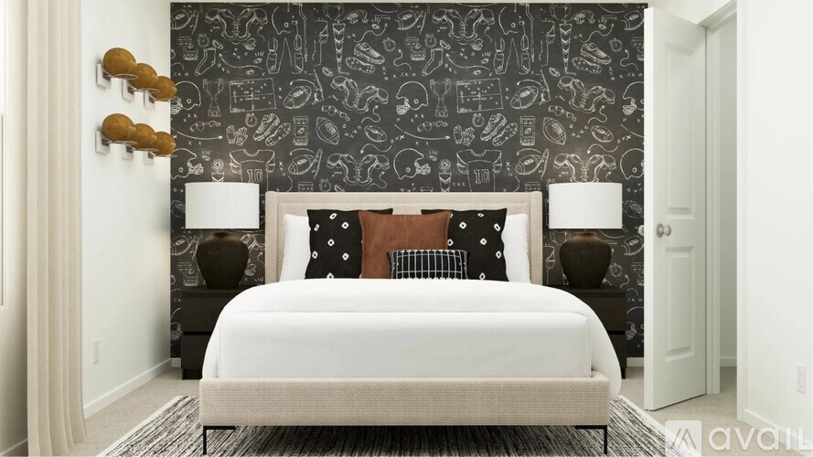 A bedroom with a patterned wallpaper and a white bed.