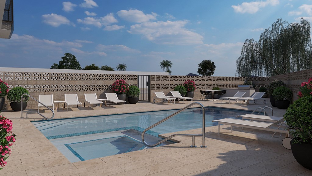 A pool surrounded by chairs and plants.